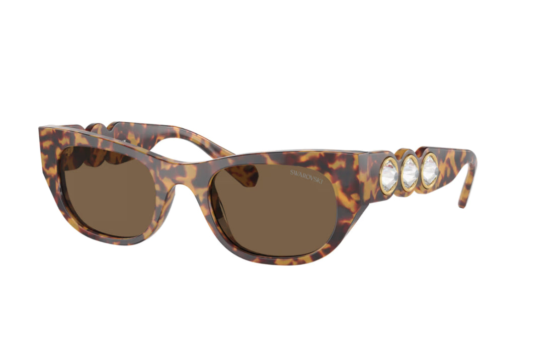 Swarovski 5691701 Occhiali da sole Forma ovale Marroni