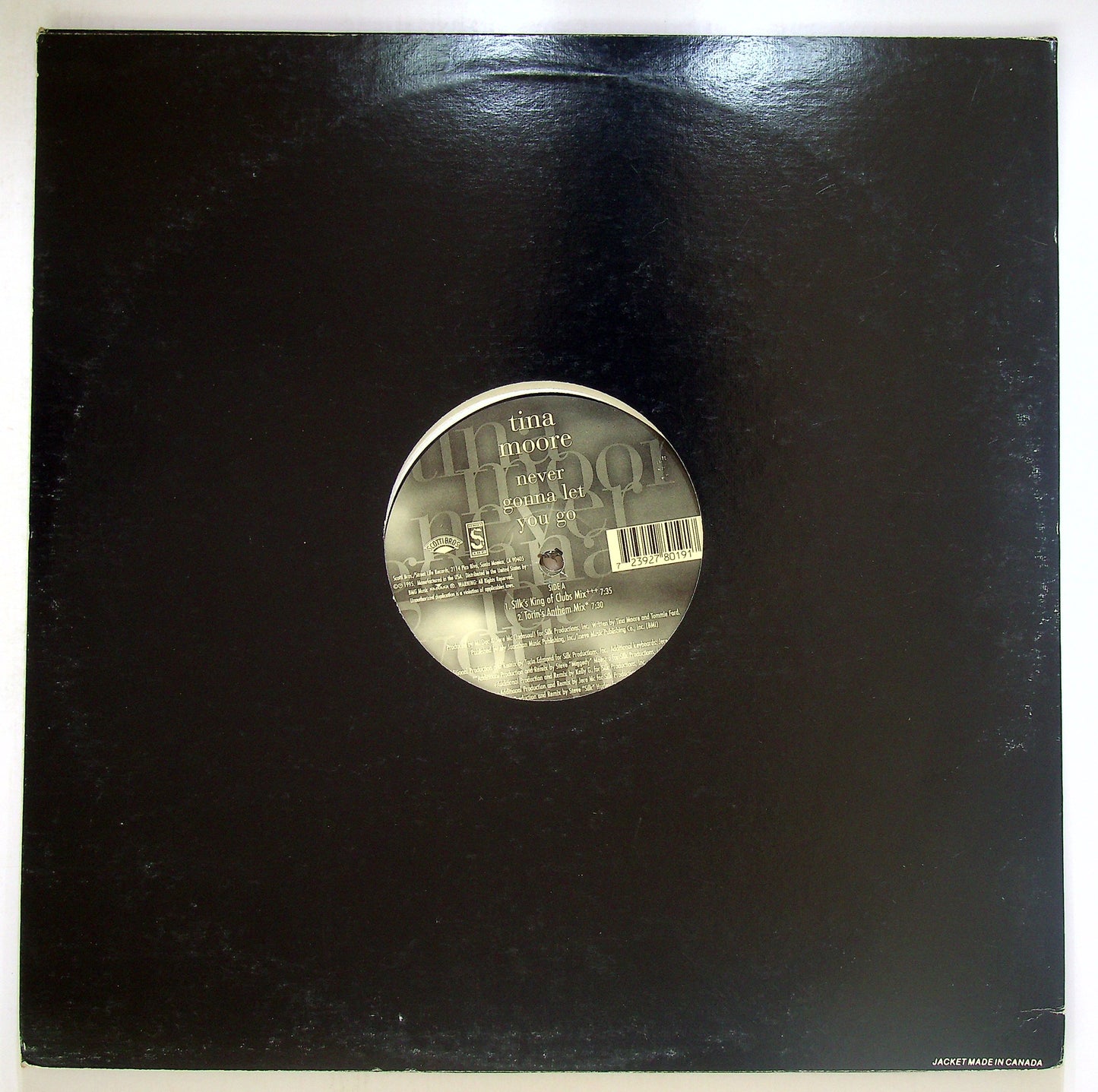 EBOND Tina Moore - Never Gonna Let You Go Vinile V095098