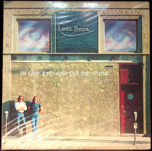 EBOND Cate Bros. - In One Eye And Out The Other Vinile V059077