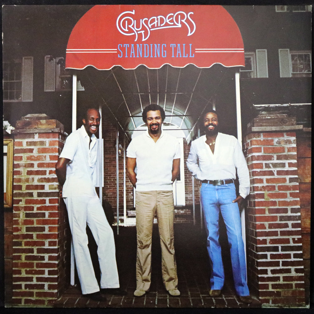 EBOND The Crusaders - Standing Tall Vinile V001126