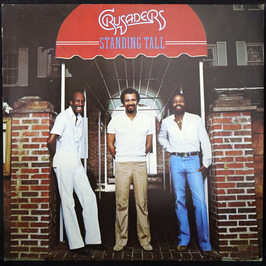 EBOND The Crusaders - Standing Tall Vinile V001126