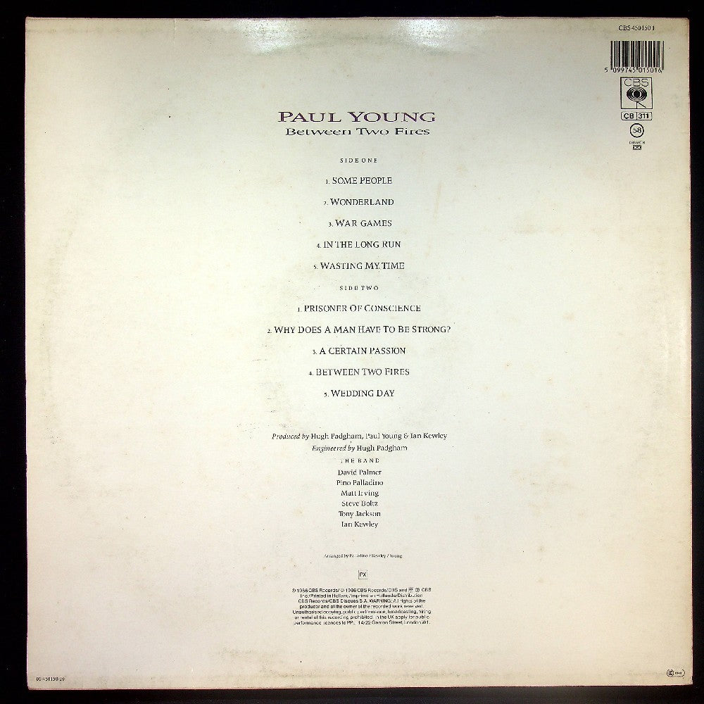 EBOND Paul Young - Between Two Fires Vinile V021135