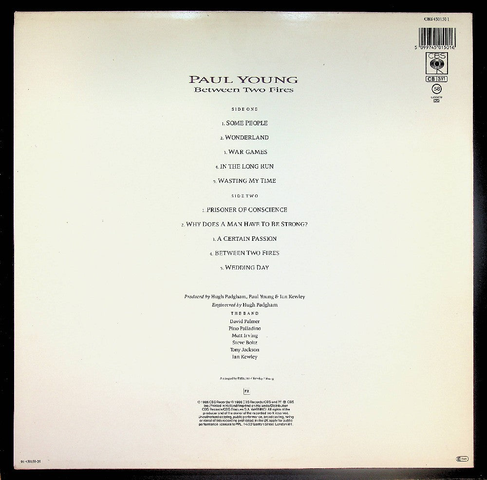 EBOND Paul Young - Between Two Fires Vinile V037112