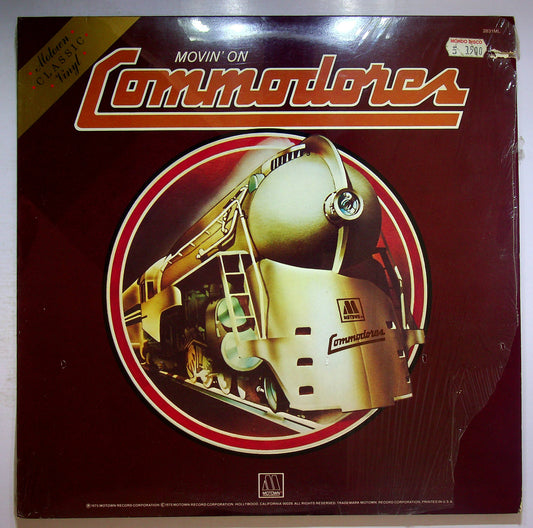 EBOND Commodores - Movin' On Vinile V077072