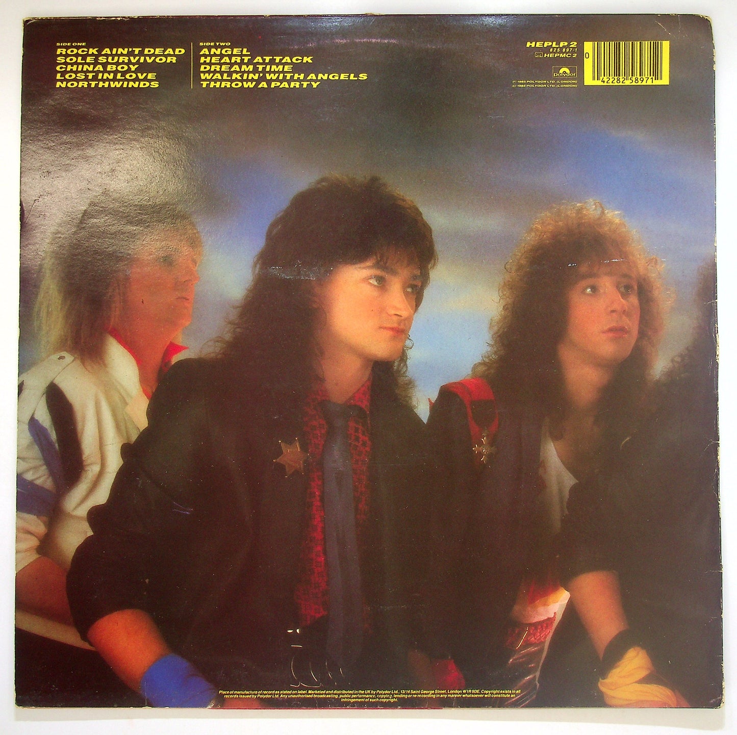 EBOND Heavy Pettin - Rock Ain't Dead Vinile V084053