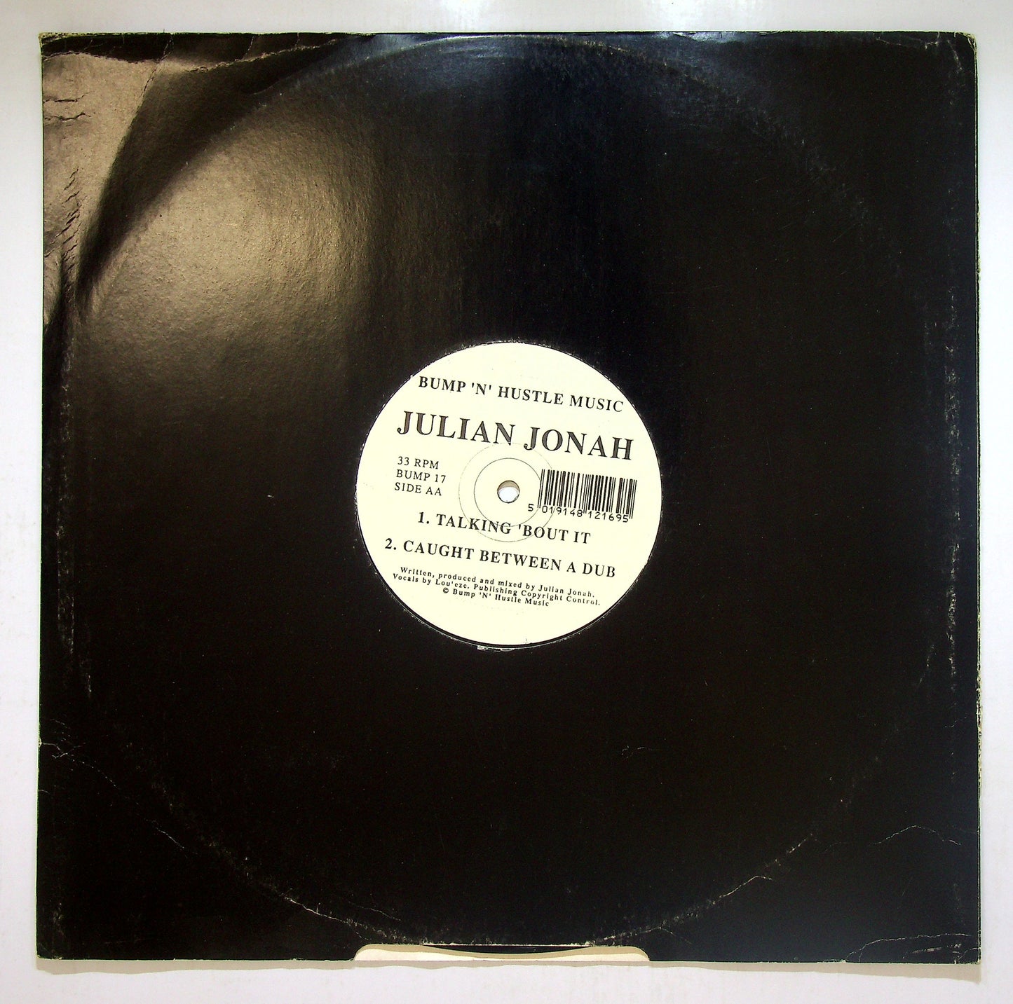 EBOND Julian Jonah - Caught Between A Rock And A Hard Place Vinile V110099