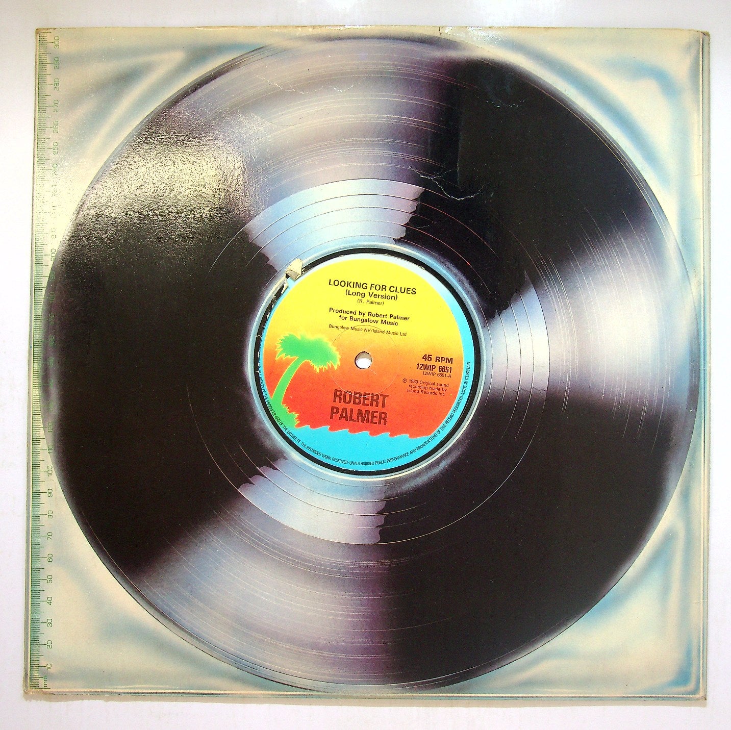 EBOND Robert Palmer - Looking For Clues Vinile V114042