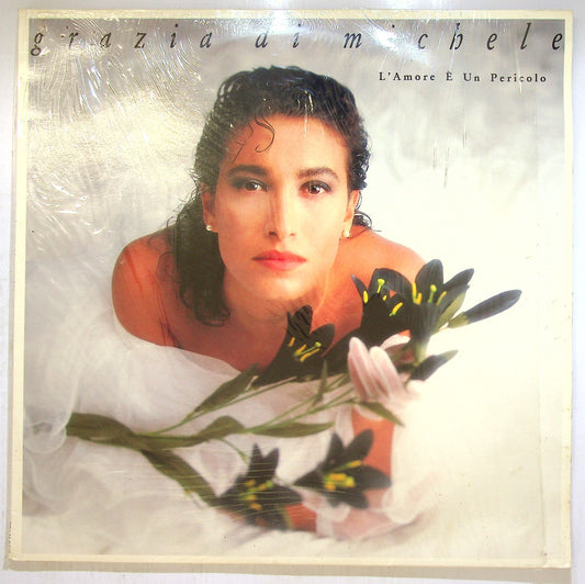 EBOND Grazia Di Michele - L'Amore E Un Pericolo Vinile V117056